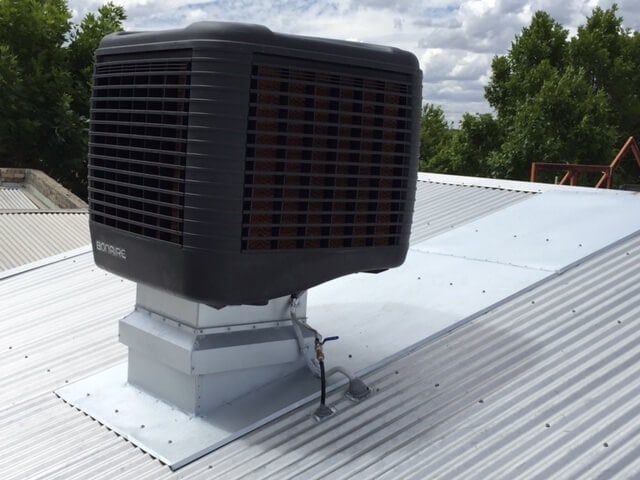 evaporative-cooling-commercial-installation-metal-roof