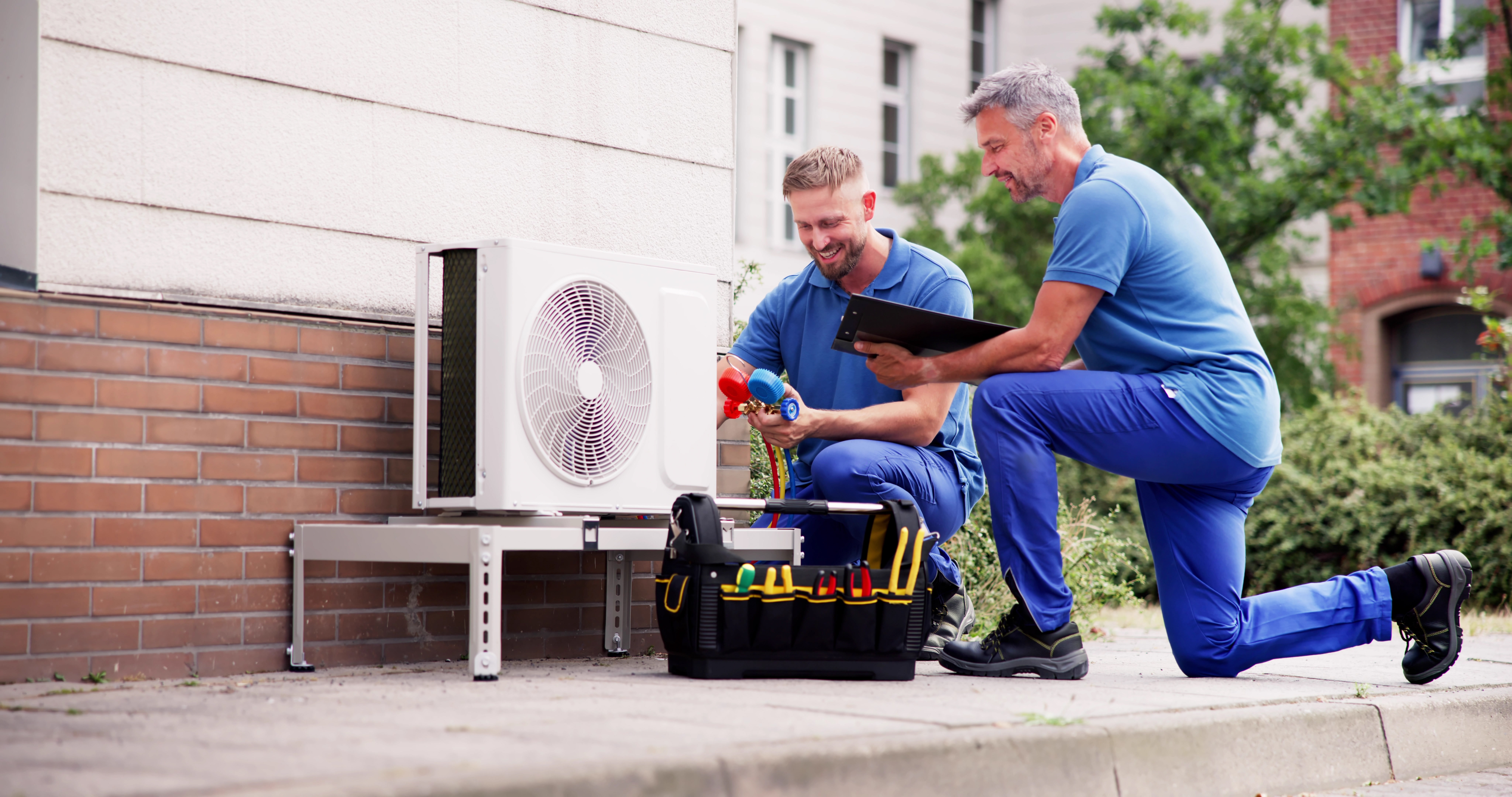 Two Air Conditioning Technicians