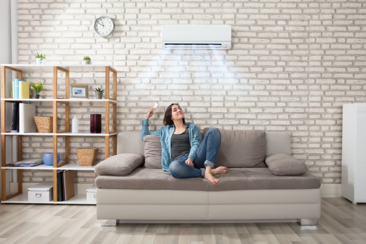 Woman relaxed in air conditioning room